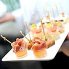 Antipasti and catering platter with different meat and cheese products