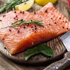 Sea bass fillet on wood background