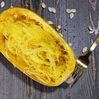 Fresh yellow squash on display at the farmers market