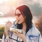 Woman Holding Chicken Wrap