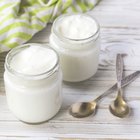 Sour cream in small bowl on yellow napkin