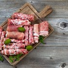 Antipasti and catering platter with different meat and cheese products