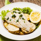 Chilean Sea Bass with potatoes and vegetables on the patio