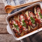 classic vegetarian lasagna on a gray stone background