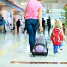 Woman and her child passing through the airport