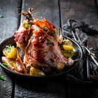 two pheasants bird, plucked and stuffed in wooden box