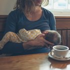 Mother is feeding her baby