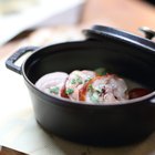 Midsection image of woman cooking food in pan