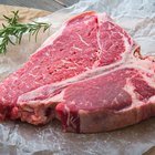 woman eating steak in a restaurant