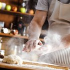 baker sifting the flour