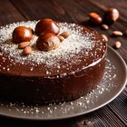 Mixing bowl, rolling pin and pie pan on kitchen counter