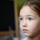 Portrait of girl with father in playroom