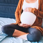 Pregnant woman walking up stairs