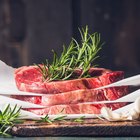 woman eating steak in a restaurant