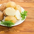 potatoes on a wooden board