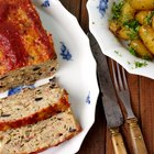 Ukrainian borsch soup and garlic buns on the table. Horizontal