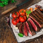 Raw Lamb Cutlets with Herbs on Slate