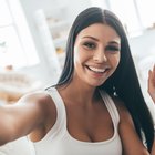 Woman waving from train