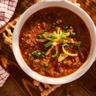 Turkey meatballs in a bowl on a wooden table