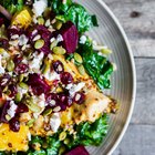 Baked halibut with vegetable garnish and couscous