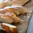 Mixing bowl, rolling pin and pie pan on kitchen counter