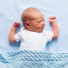 Pediatrician examining baby