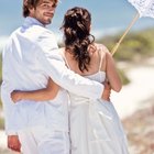 People Throwing Confetti Over a Newlywed Couple Leaving Church