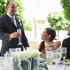 Bride and groom holding hands outdoors