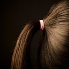 Close-up of a girl wearing a curly pink wig