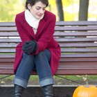 Young woman resting on bean bag chair, low section (video still)