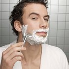 Directly Above Shot Of Shaving Brush And Razor On Marble Floor