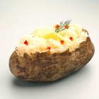 Dollop of sour cream on baked potato