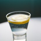 Jar of mustard and spoon with mustard above jar, extreme close-up, part of