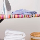 Man ironing laundry
