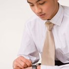 Woman looking at wristwatch in sports attire