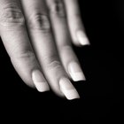 Young woman making manicure in beauty parlour, elevated view