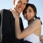 Newlyweds driving in convertible with 