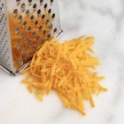 Shredded cheese and grater