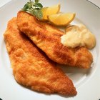 Fried fish fillet, Atlantic cod with rosemary in pan