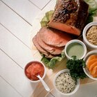 Roasted knuckle of pork with boiled cabbage, bread, horseradish