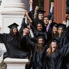 Men and woman in graduation cap and gown