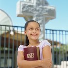 Little girl reading bible