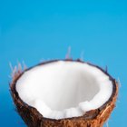 Coconut Flakes in Wooden Spoon