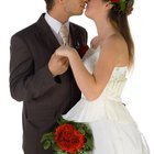 Bride and groom holding hands outdoors