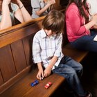 Youth ministry praying as pastor reads from Bible