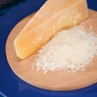 fresh ricotta in olive wood bowl on old table