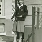 Smiling woman listening to a record