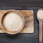 Flour in a bowl on a rustic wooden kitchen table