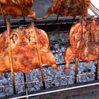 two pieces of grilled pork an old table top view