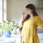 Pregnant woman taking a break from her exercise